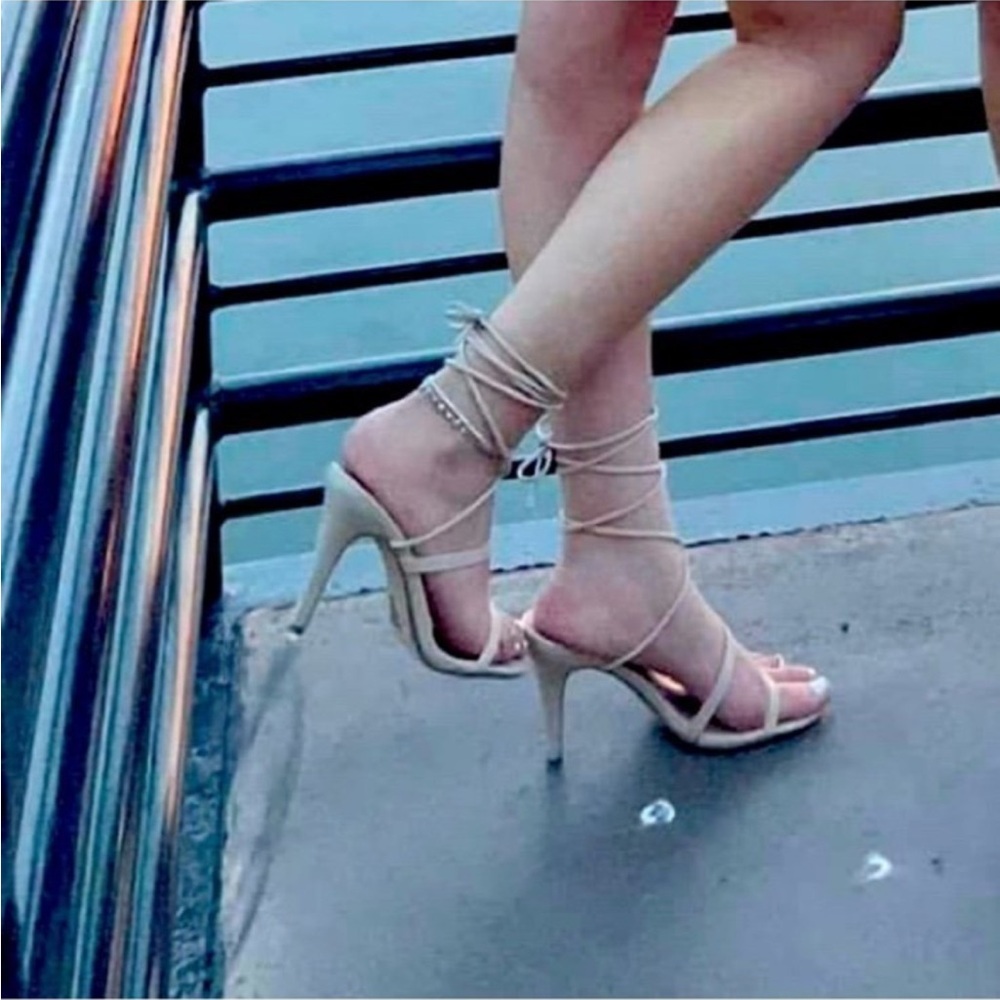 Nude strap up heels